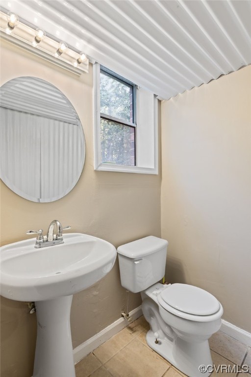 1601 Olde Coalmine Road Midlothian, VA 23113 - Photo 18 of 40 a bathroom with a toilet a sink and a window