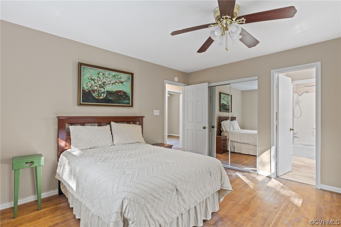 1601 Olde Coalmine Road Midlothian, VA 23113 - Photo 26 of 40 a bedroom with a bed and a chandelier