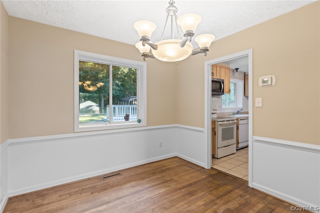 1601 Olde Coalmine Road Midlothian, VA 23113 - Photo 10 of 40 a kitchen with a refrigerator and dishwasher