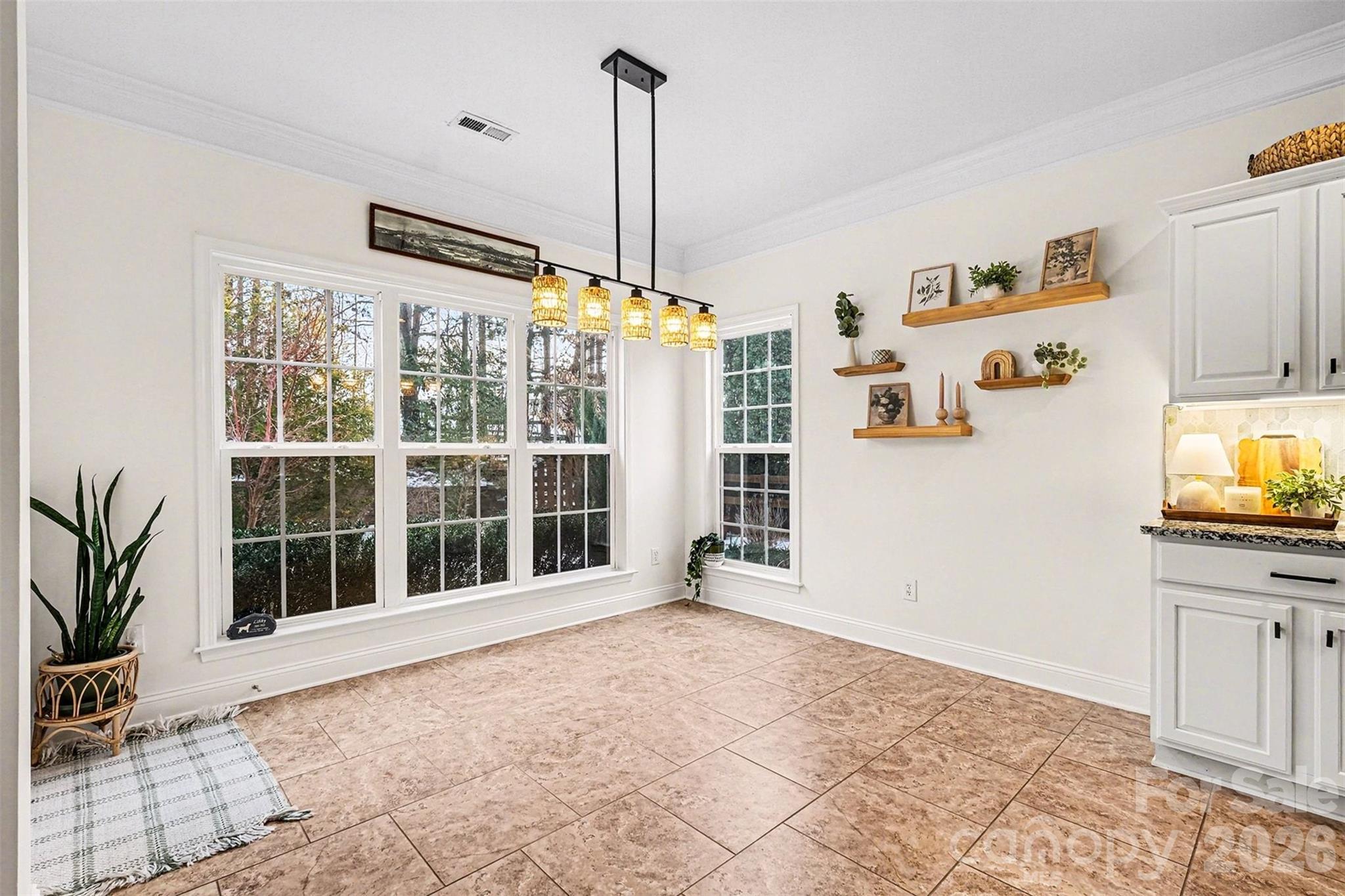 126 Burtons Barn Road Mooresville, NC 28115 - Photo 25 of 48 a view of a livingroom with a flat screen tv