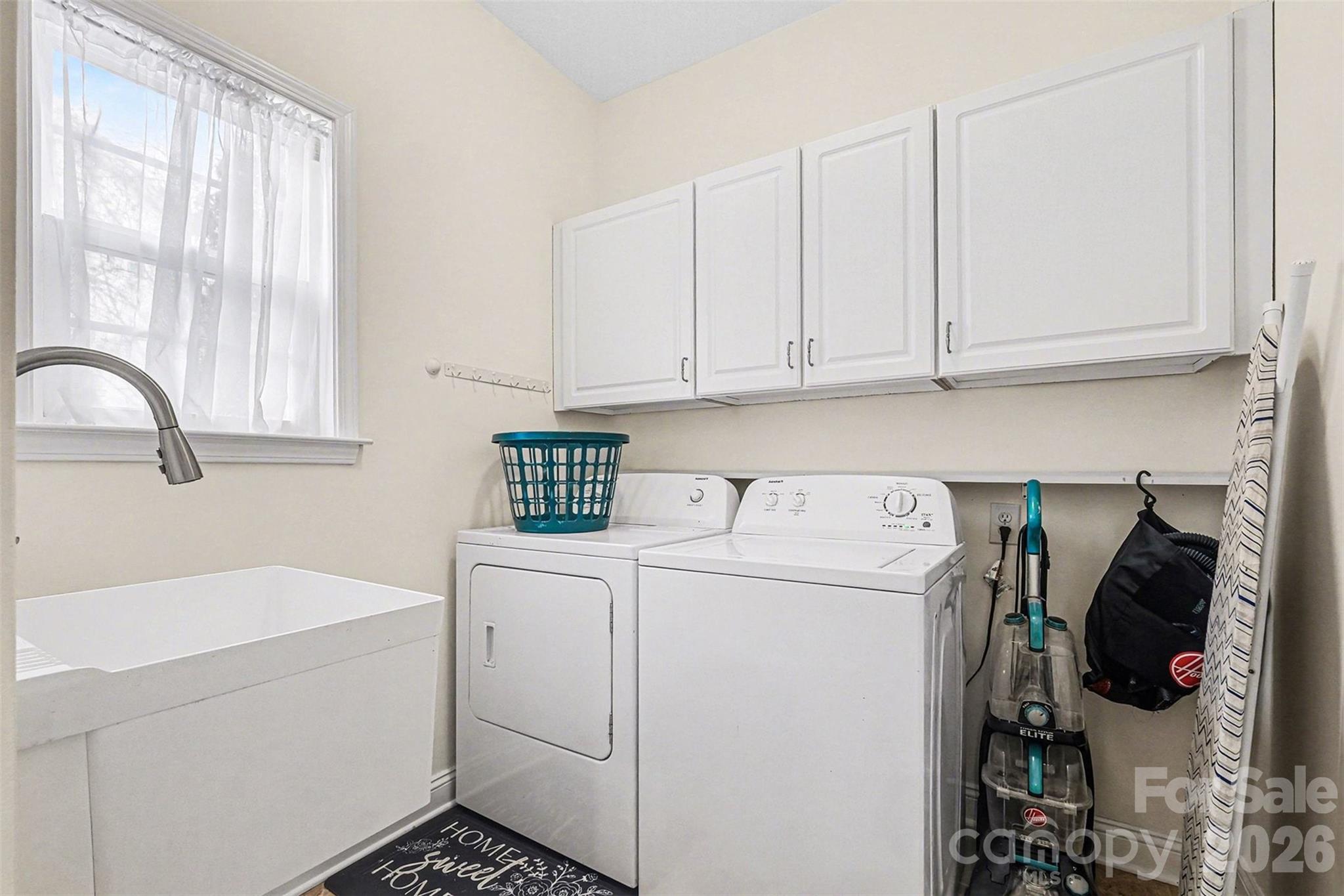 126 Burtons Barn Road Mooresville, NC 28115 - Photo 27 of 48 a utility room with dryer and washer