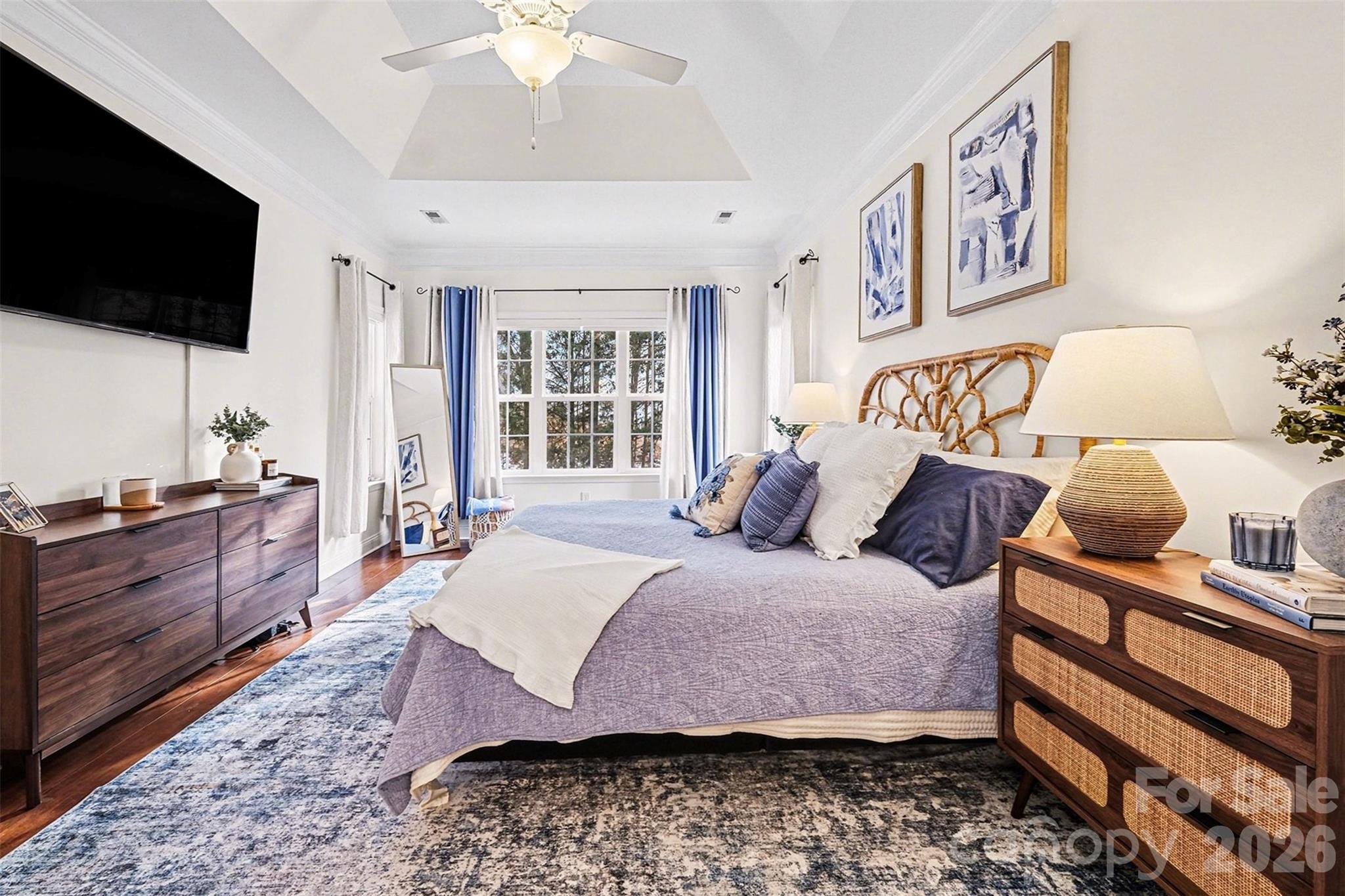 126 Burtons Barn Road Mooresville, NC 28115 - Photo 36 of 48 a bedroom with a bed and flat screen tv