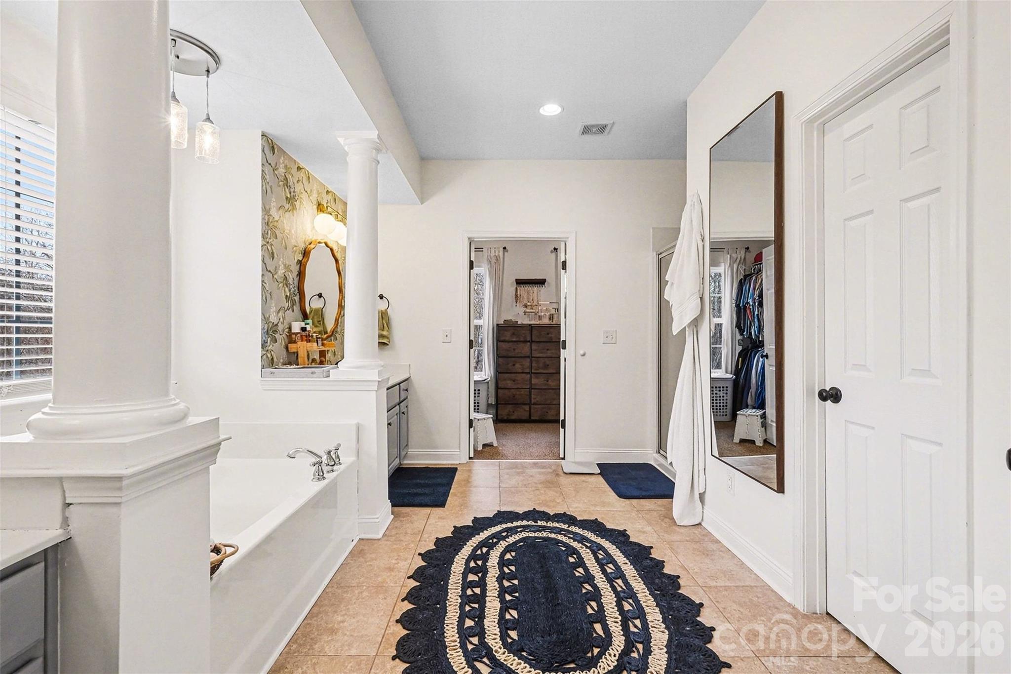 126 Burtons Barn Road Mooresville, NC 28115 - Photo 37 of 48 a view of bathroom with a sink and a mirror