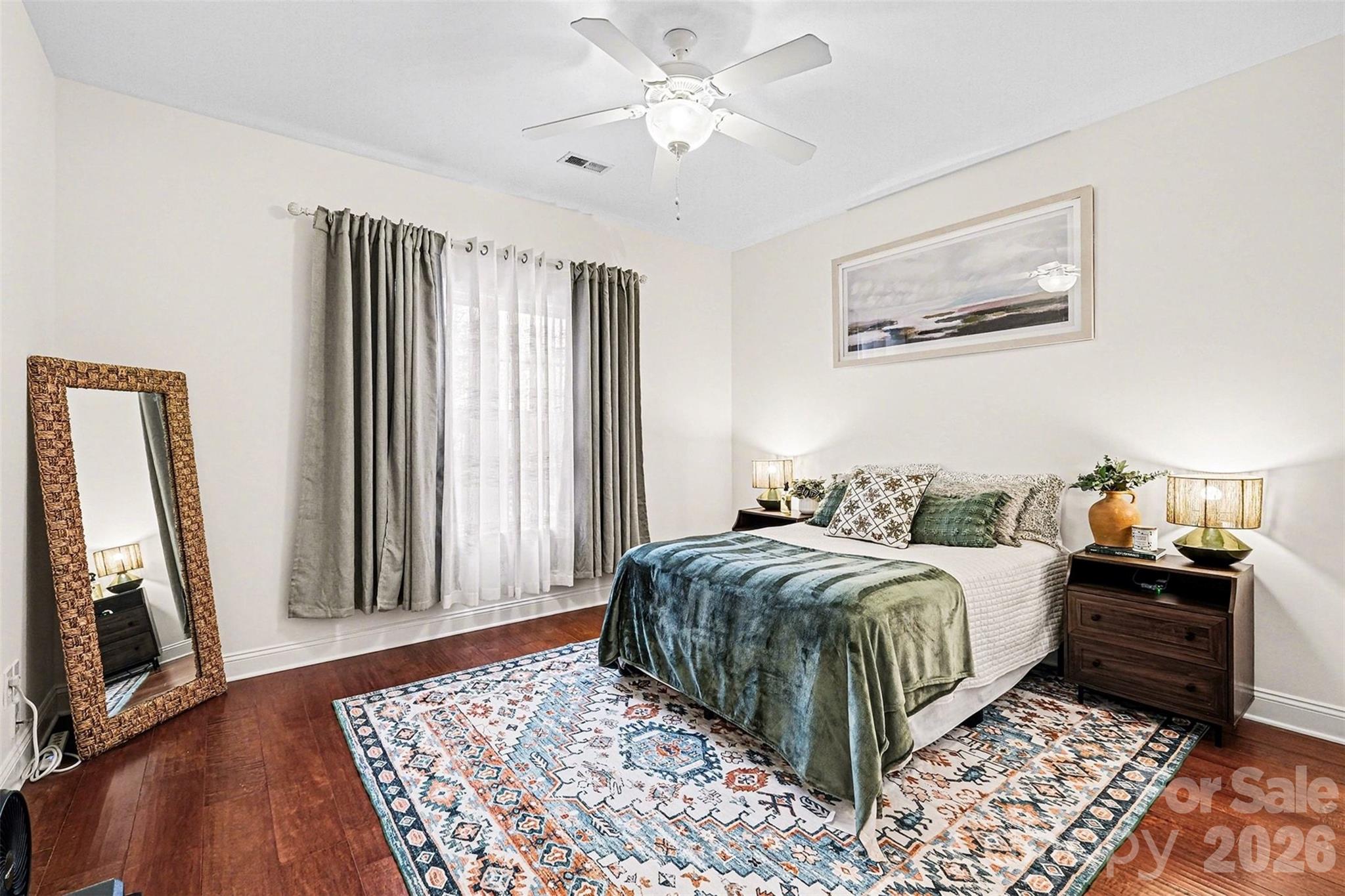 126 Burtons Barn Road Mooresville, NC 28115 - Photo 44 of 48 a bedroom with a bed and a large mirror on the dresser