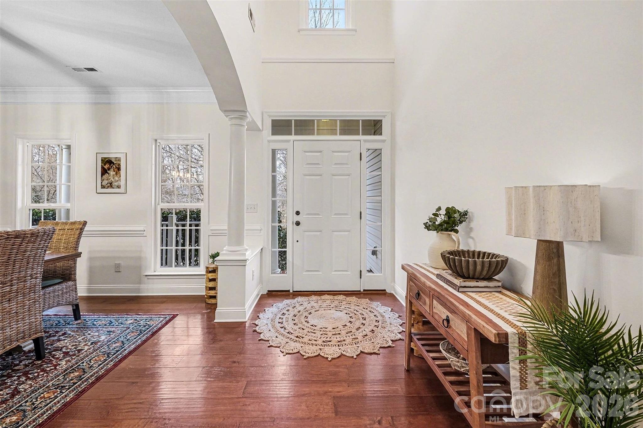 126 Burtons Barn Road Mooresville, NC 28115 - Photo 7 of 48 a bedroom with furniture and wooden floor