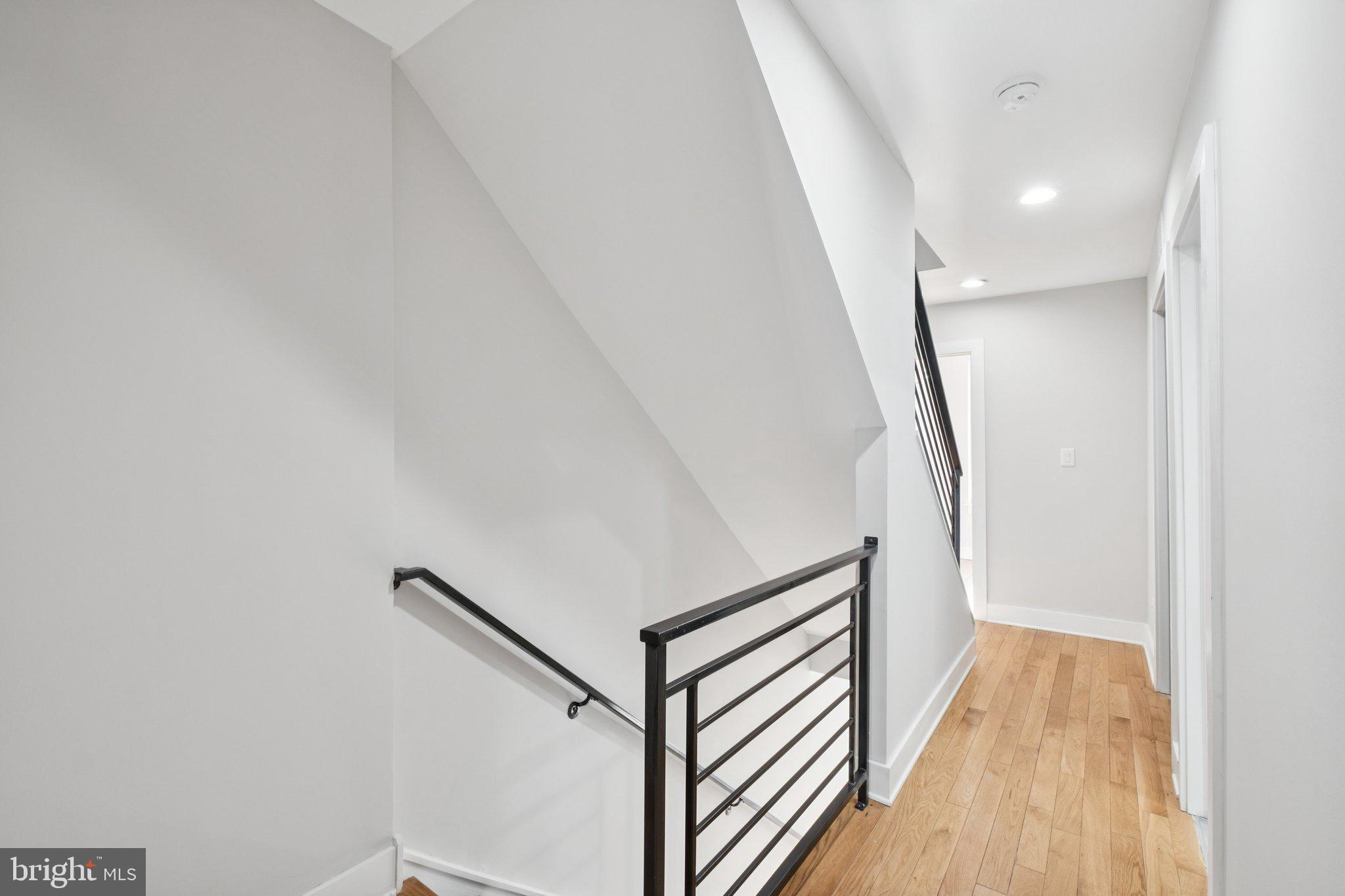 1811 Wilder Street Philadelphia, PA 19146 - Photo 17 of 37 a view of a hallway with wooden floor