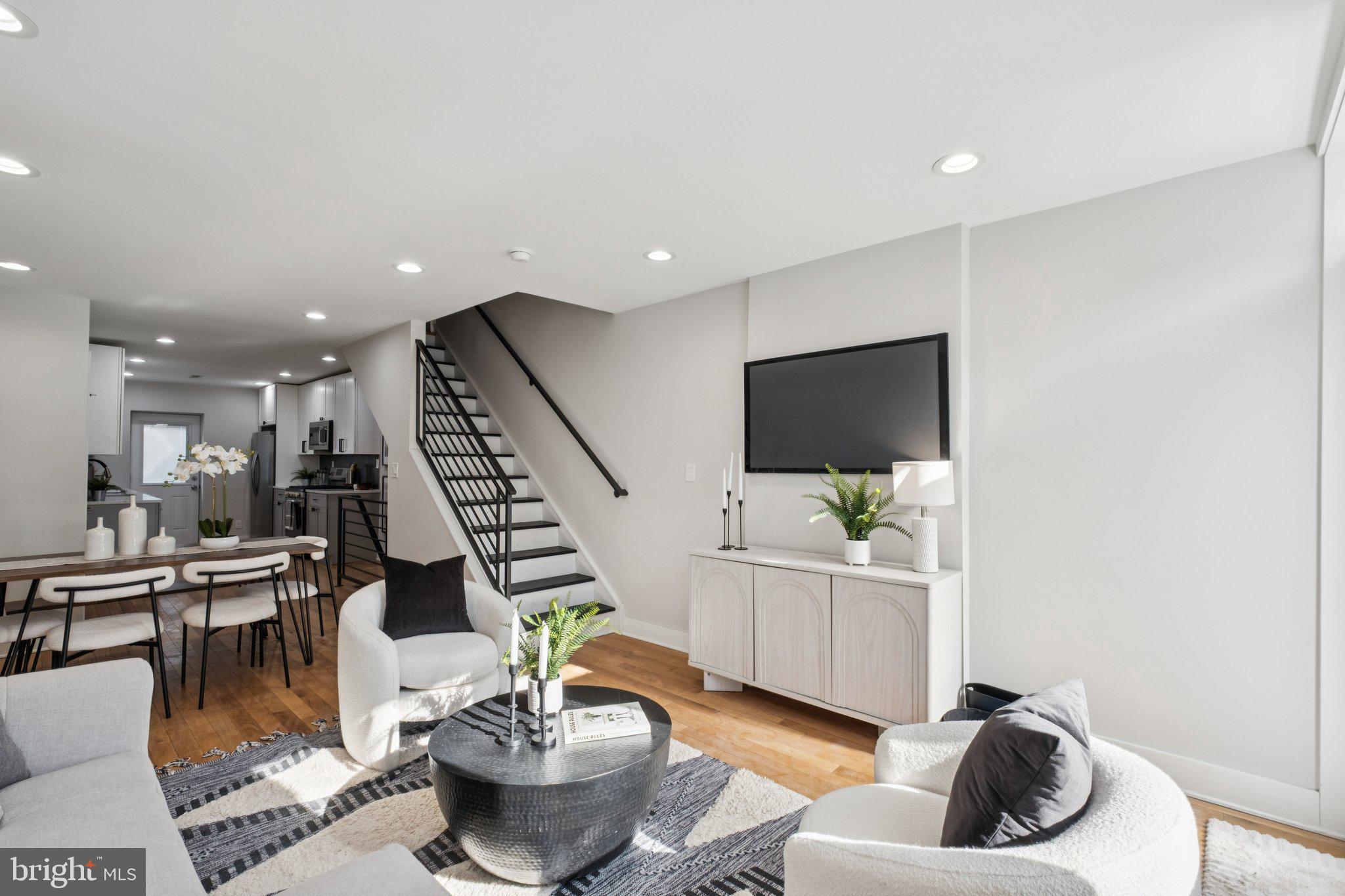 1811 Wilder Street Philadelphia, PA 19146 - Photo 6 of 37 a living room with furniture and wooden floor