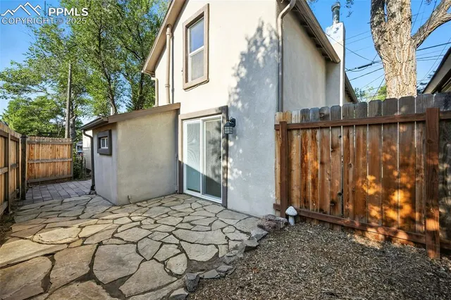 a view of a house with backyard of the house
