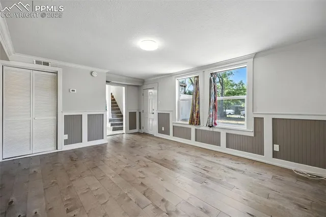 an empty room with windows