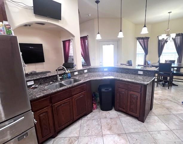 2102 Stone Gate Drive Harlingen, TX 78552 - Photo 12 of 35 a spacious kitchen with a sink and a wooden floor