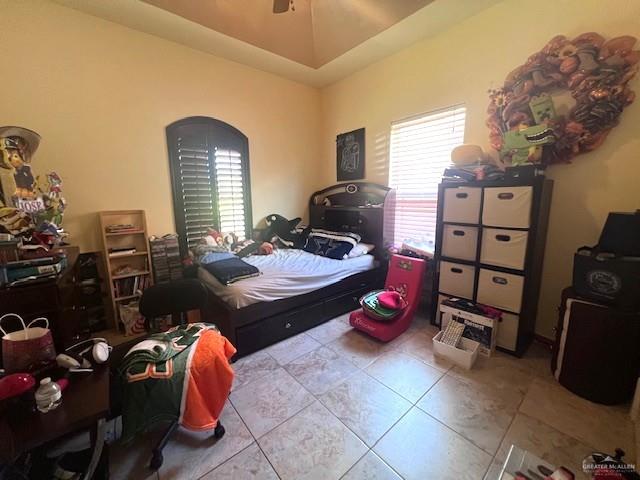 2102 Stone Gate Drive Harlingen, TX 78552 - Photo 23 of 35 a bedroom with bed and gym equipment