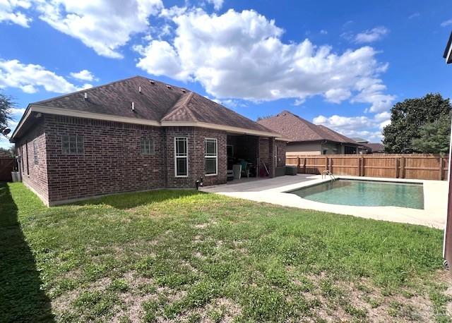 2102 Stone Gate Drive Harlingen, TX 78552 - Photo 33 of 35 a view of a house with a backyard