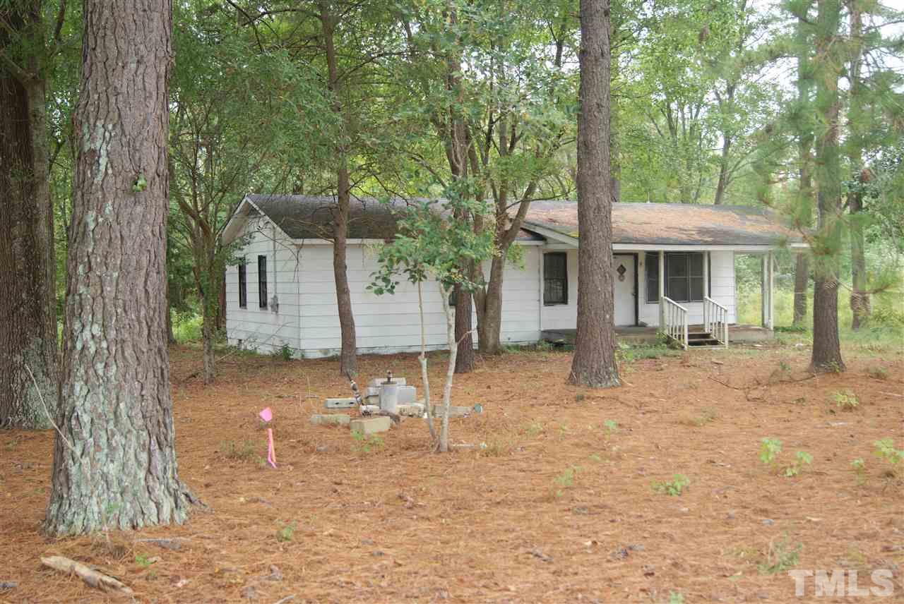 2817 Alron Road Wendell, NC 27591 - Photo 1 of 4 a backyard of a house with table and chairs