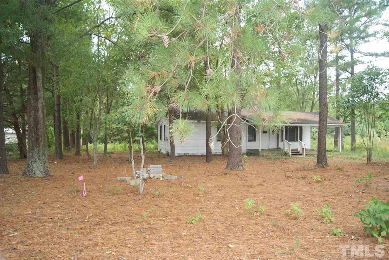 2817 Alron Road Wendell, NC 27591 - Photo 2 of 4 a house with trees in front of it