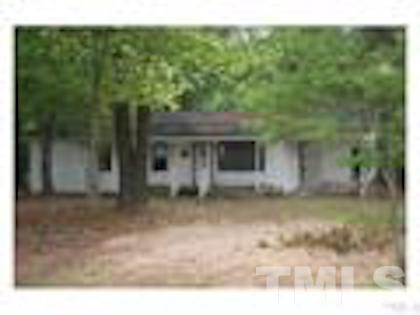 2817 Alron Road Wendell, NC 27591 - Photo 3 of 4 a view of a house with a yard