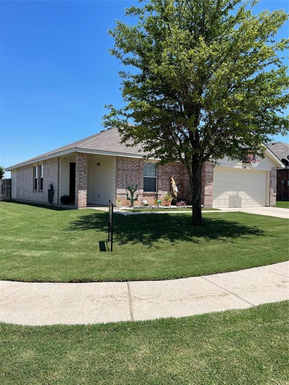 12501 Shine Avenue Rhome, TX 76078 - Photo 1 of 1 a view of a house with a yard