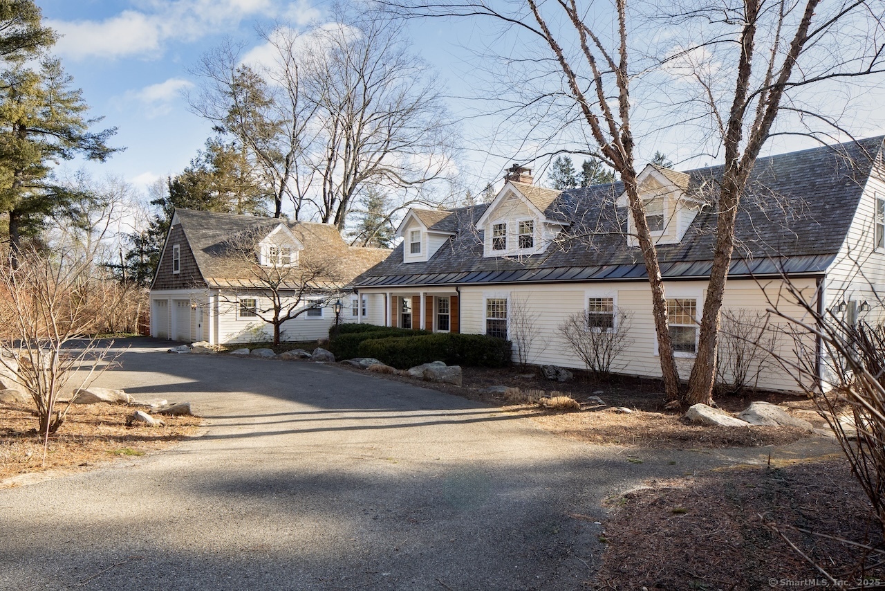 70 Belgo Road Salisbury, CT 06039 - Photo 1 of 1 a view of a house with a yard covered with snow in the road