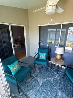3685 Stone Way Estero, FL 33928 - Photo 11 of 27 a living room with furniture and a potted plant
