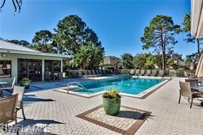 3685 Stone Way Estero, FL 33928 - Photo 14 of 27 a view of a house with backyard sitting area and garden
