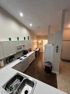 3685 Stone Way Estero, FL 33928 - Photo 2 of 27 a kitchen with stainless steel appliances granite countertop a refrigerator a stove and a sink