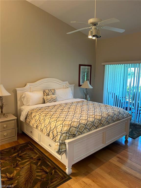 3685 Stone Way Estero, FL 33928 - Photo 21 of 27 a bed sitting in a bedroom next to a window