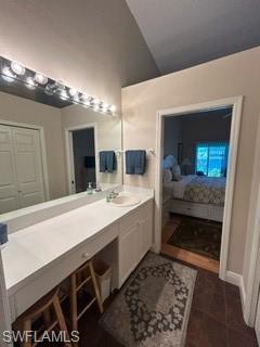 3685 Stone Way Estero, FL 33928 - Photo 23 of 27 a bathroom with a sink and a mirror