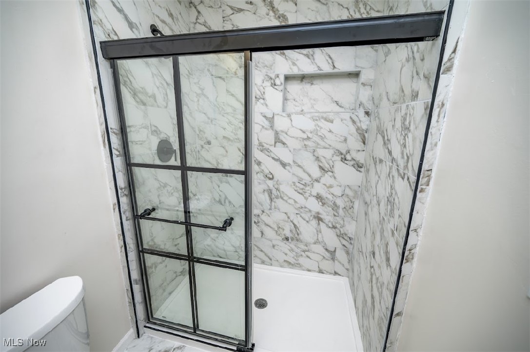 6006 Tippecanoe Road Canfield, OH 44406 - Photo 22 of 35 Full bath with a shower stall and toilet
