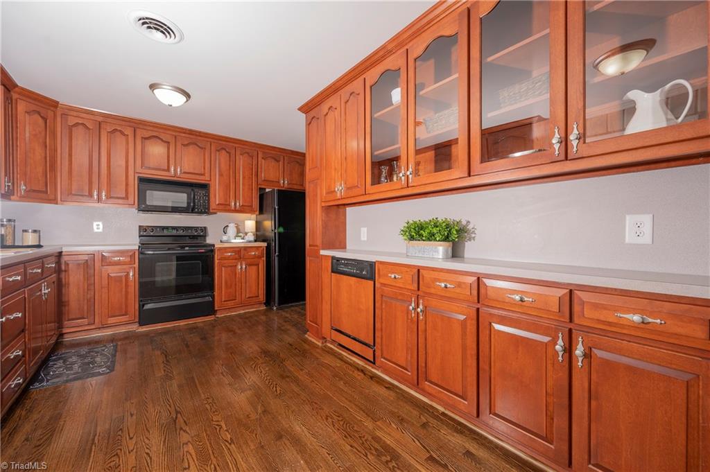 9092 Lasater Road Clemmons, NC 27012 - Photo 21 of 39 Glass front cabinets to display more of your favorite things