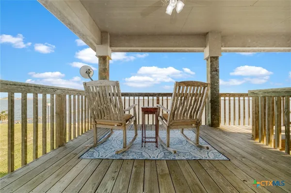 a kitchen with cabinets and stainless steel appliances