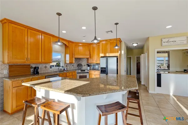 $589,999 | 1588 West Bayshore Drive, Palacios, TX 77465