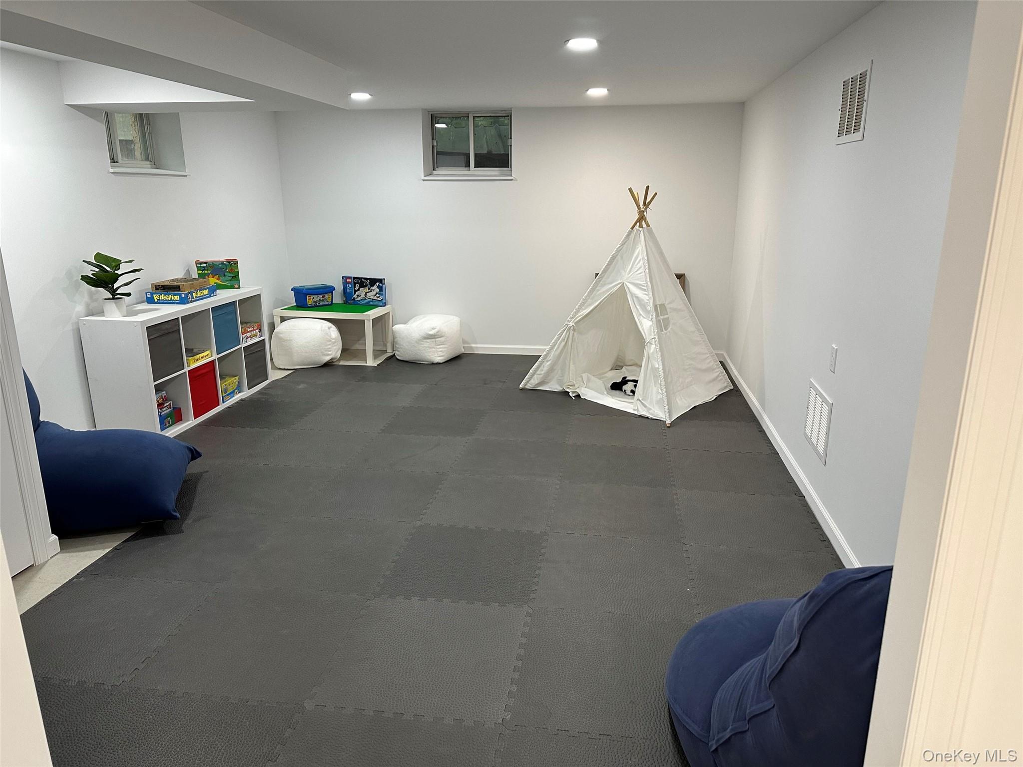 88 Spier Road Scarsdale, NY 10583 - Photo 20 of 26 Rec room featuring recessed lighting and baseboards