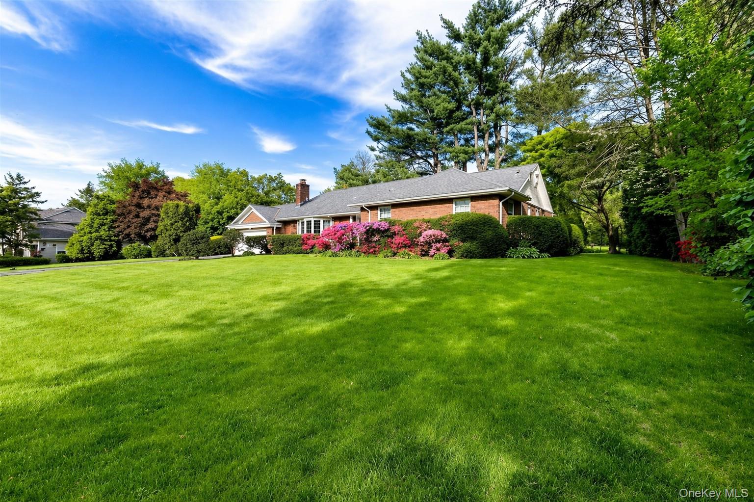 88 Spier Road Scarsdale, NY 10583 - Photo 2 of 26 View of grassy yard