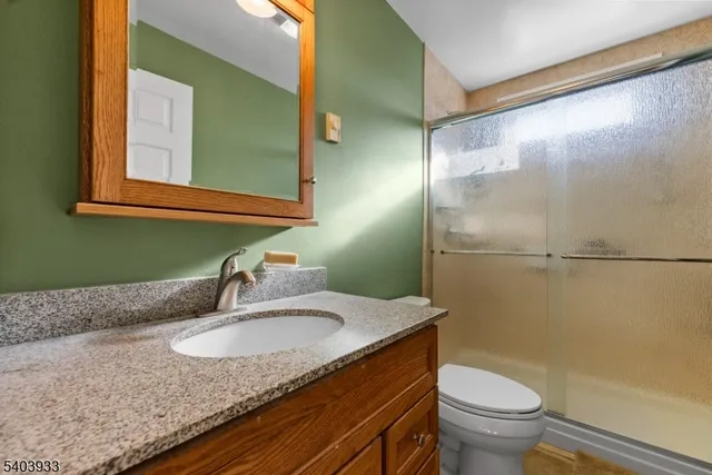 a bed room with furniture and a window