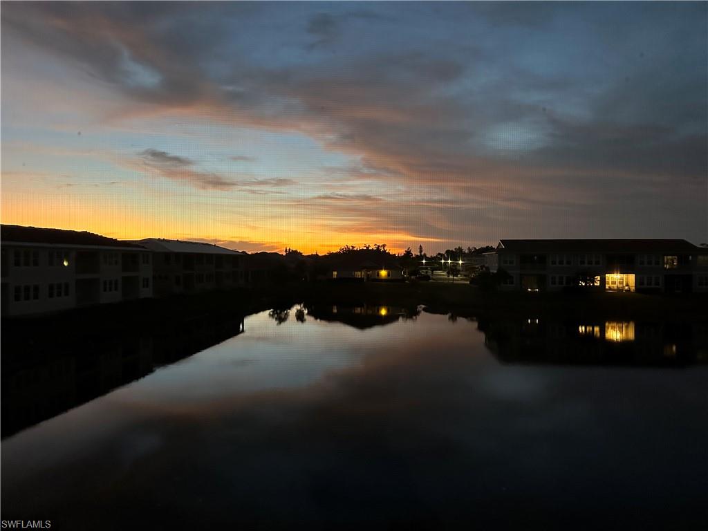 4705 Arboretum Circle, Unit 203 Naples, FL 34112 - Photo 25 of 31 a view of sunset