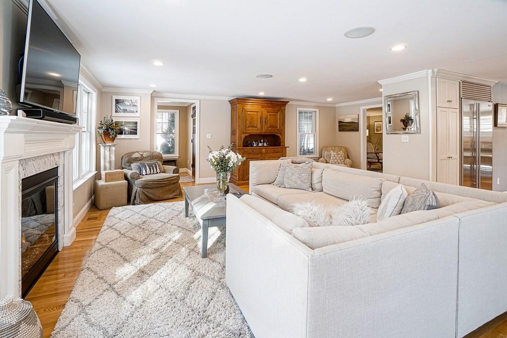 9 Madison Road Wellesley, MA 02481 - Photo 12 of 40 a living room with furniture fireplace and flat screen tv