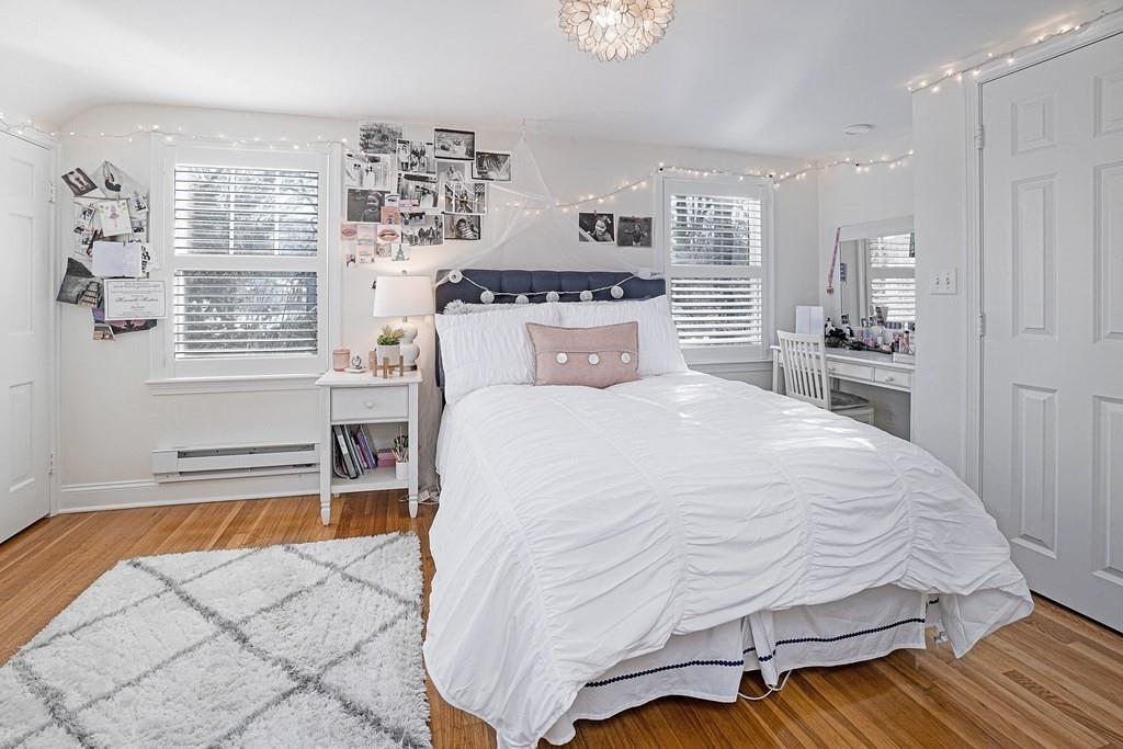 9 Madison Road Wellesley, MA 02481 - Photo 17 of 40 a large bed sitting in a kitchen next to a window