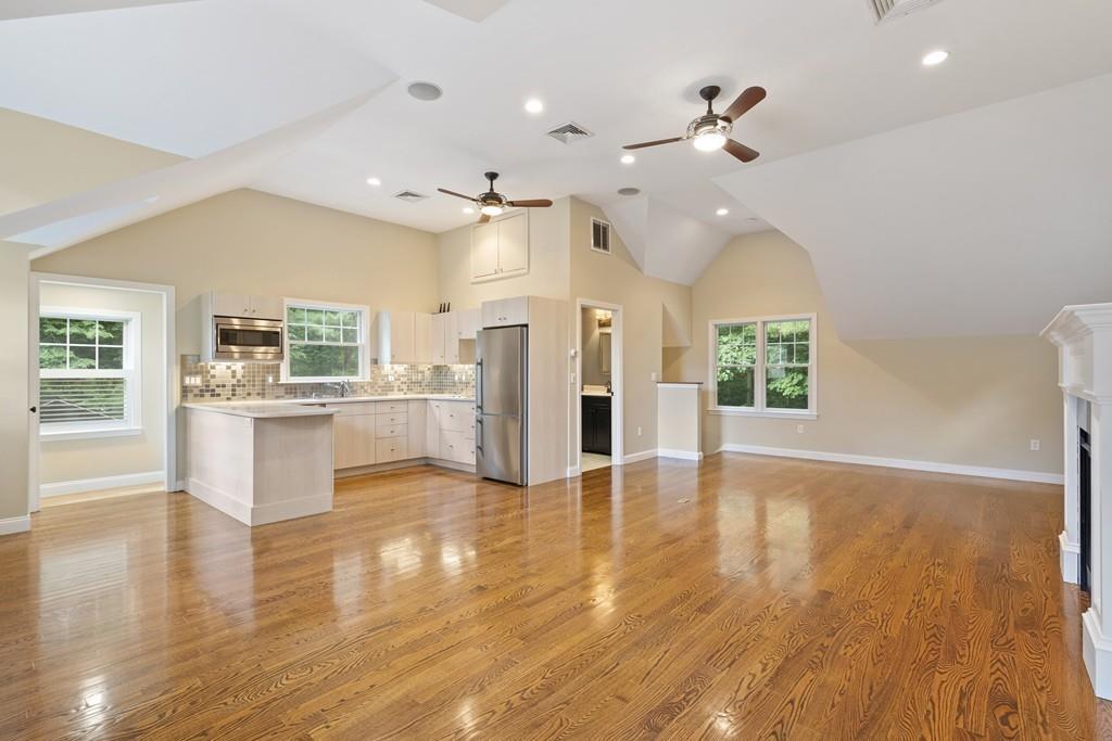 9 Madison Road Wellesley, MA 02481 - Photo 26 of 40 a large kitchen with cabinets and wooden floor