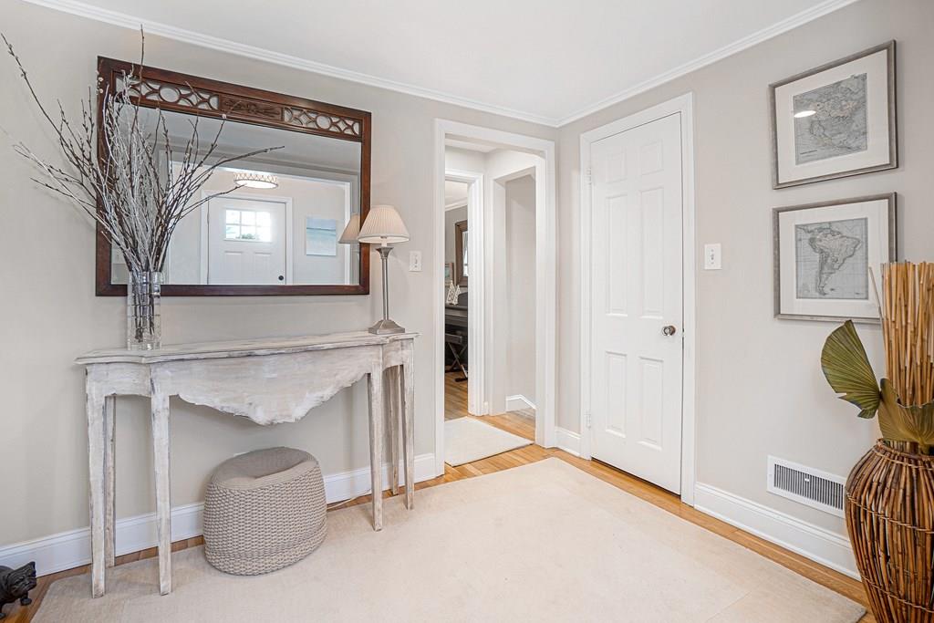 9 Madison Road Wellesley, MA 02481 - Photo 3 of 40 a living room with a furniture and a fireplace