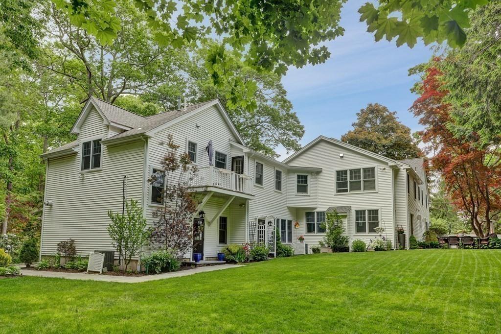 9 Madison Road Wellesley, MA 02481 - Photo 34 of 40 a front view of a house with a garden