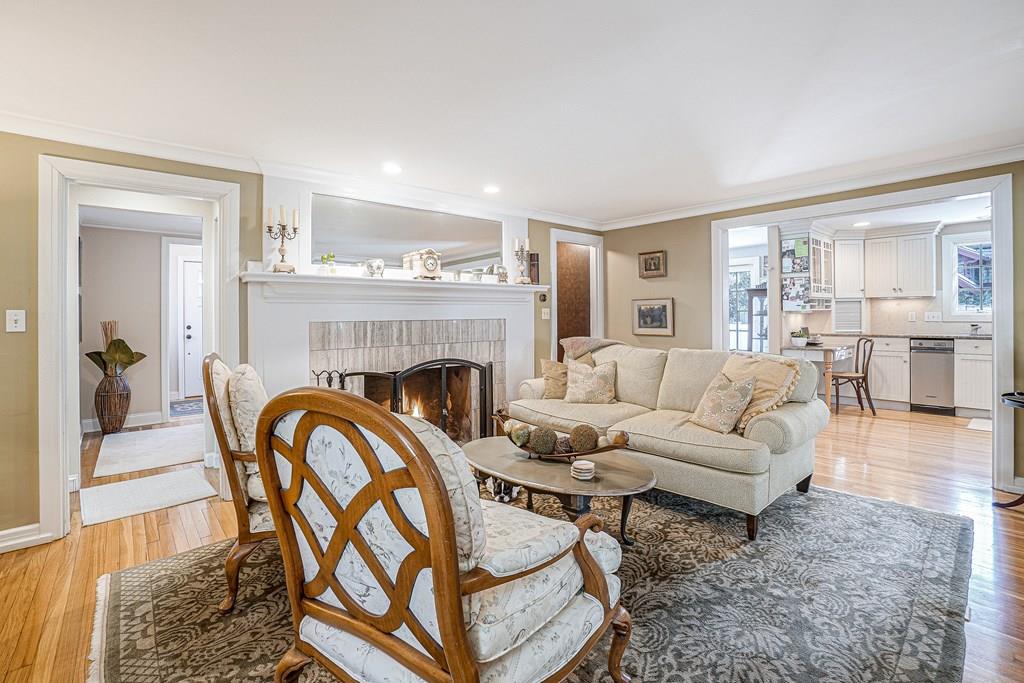 9 Madison Road Wellesley, MA 02481 - Photo 4 of 40 a living room with furniture and a fireplace