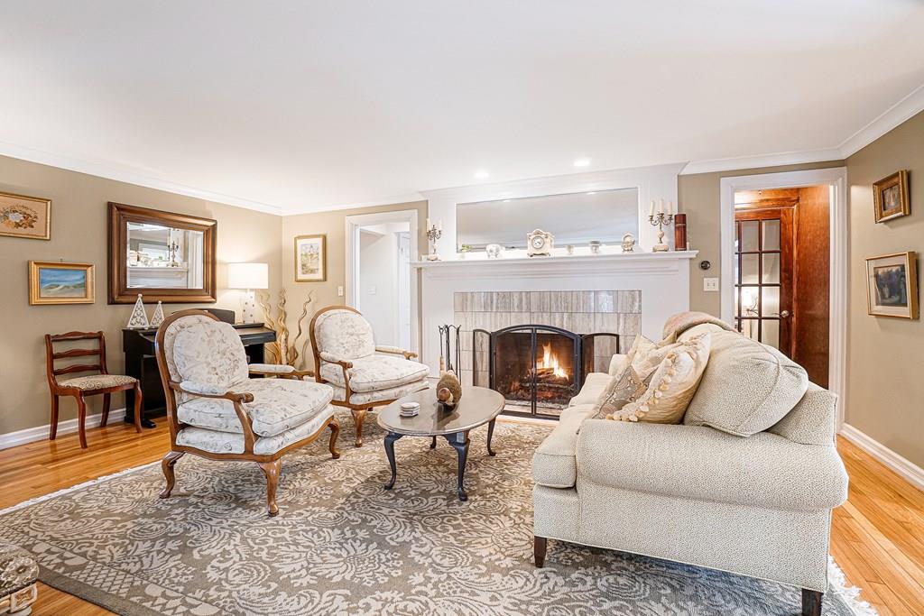 9 Madison Road Wellesley, MA 02481 - Photo 5 of 40 a living room with furniture and a fireplace
