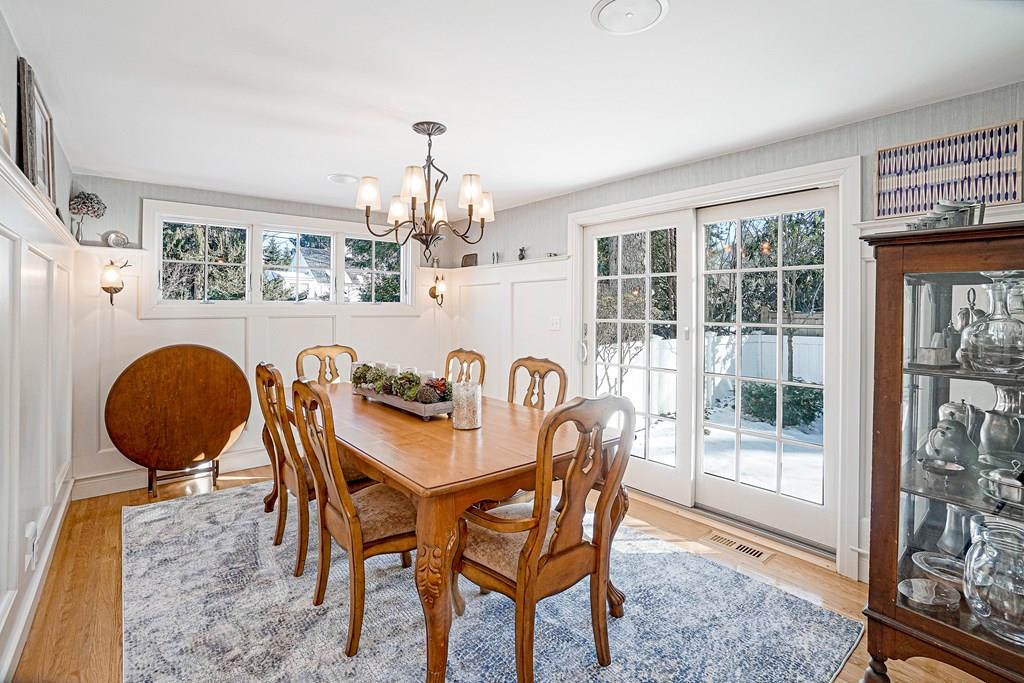 9 Madison Road Wellesley, MA 02481 - Photo 9 of 40 a view of a dining room with furniture wooden floor and chandelier