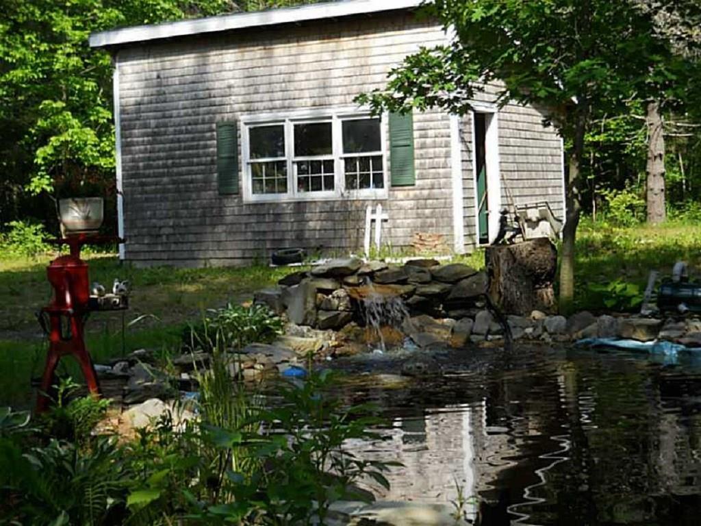 19 Hodgdon Road Levant, ME 04456 - Photo 3 of 35 Beautiful pond with working waterfall