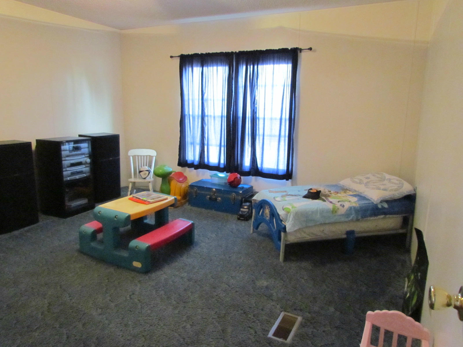 109 Westgrove Road Blue Ridge, VA 24064 - Photo 12 of 14 a bedroom with bed and window