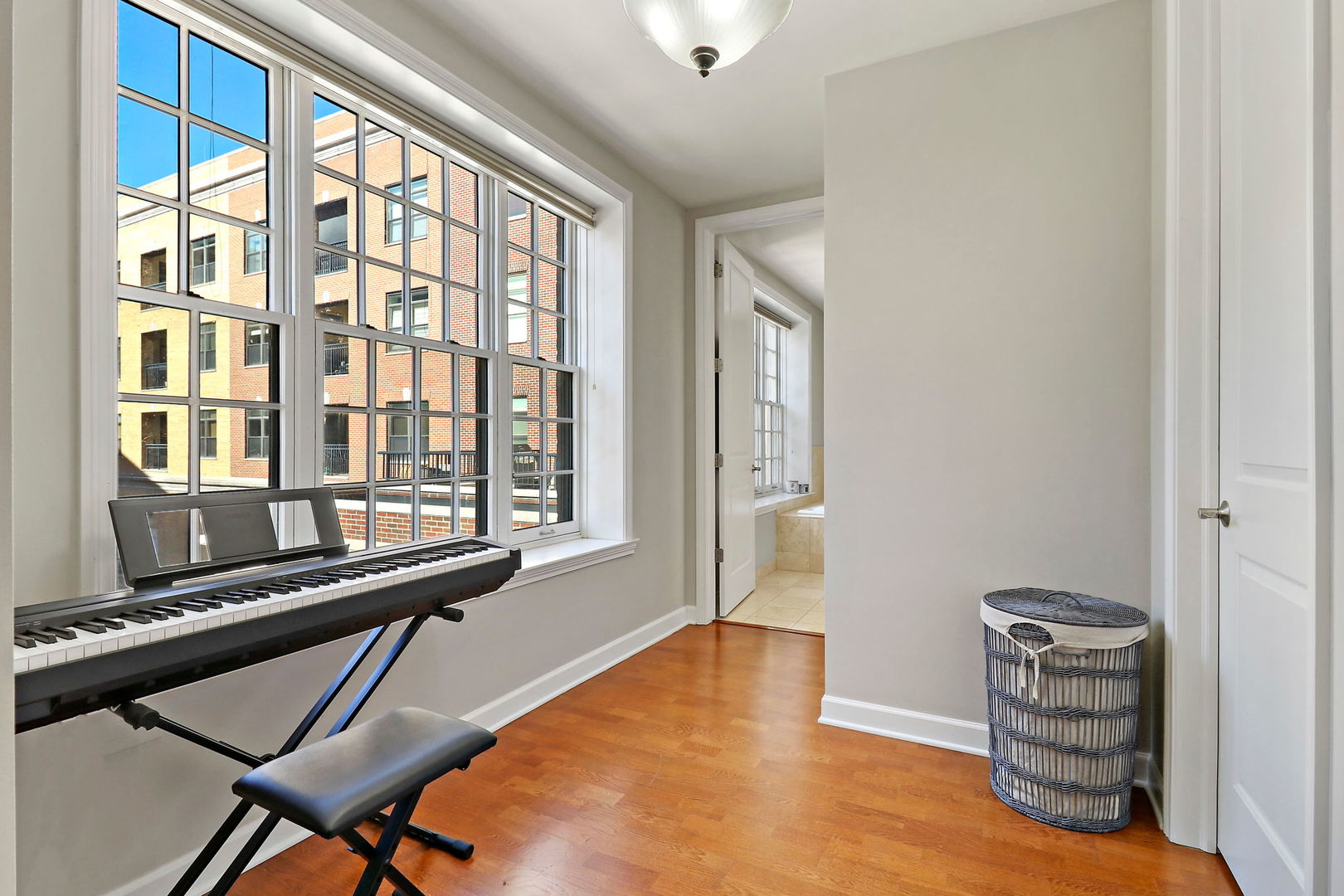 50 North Plum Grove Road, Unit 201E Palatine, IL 60067 - Photo 12 of 22 a view of a workspace with furniture and a window