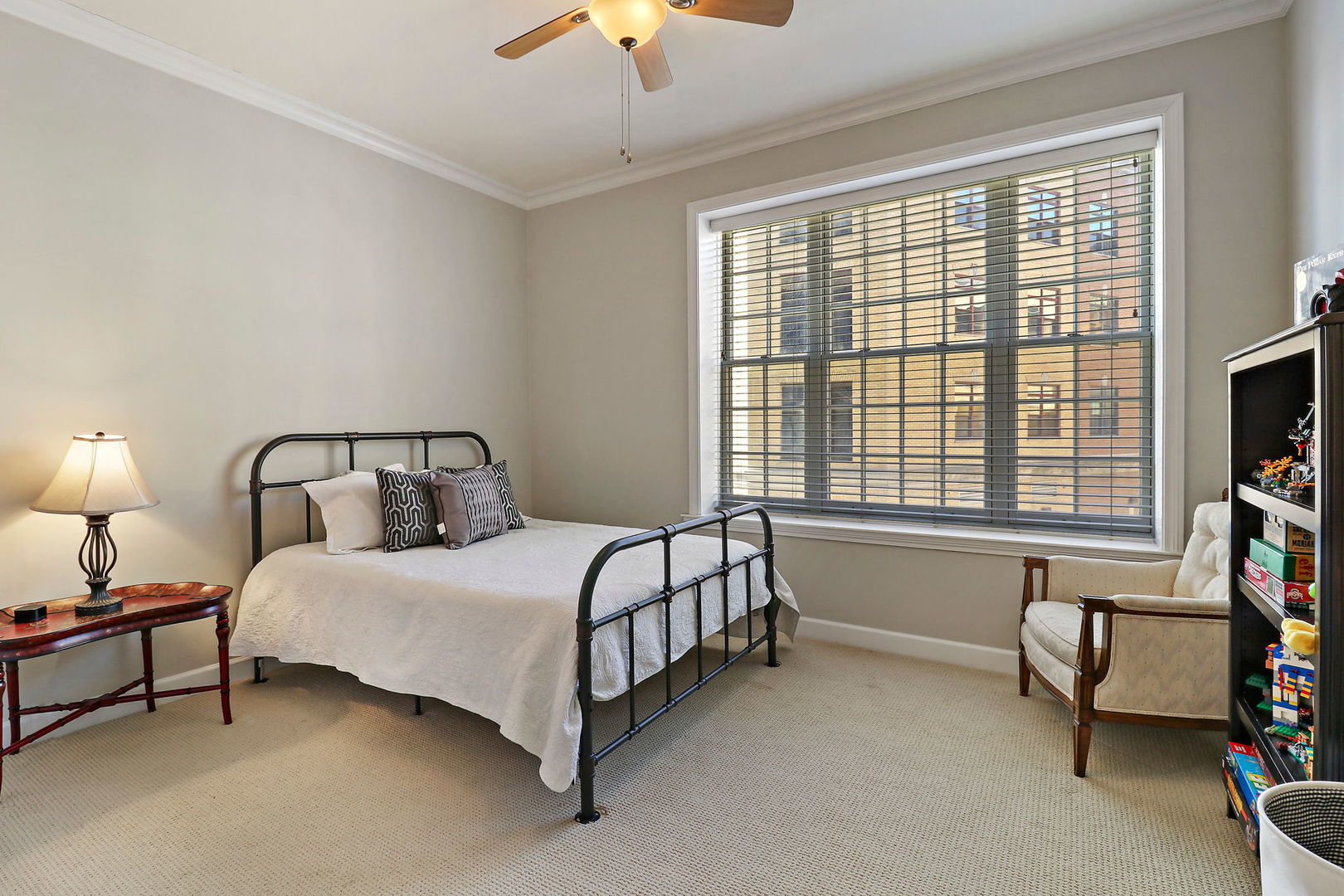50 North Plum Grove Road, Unit 201E Palatine, IL 60067 - Photo 14 of 22 a bed sitting in a bedroom next to a window