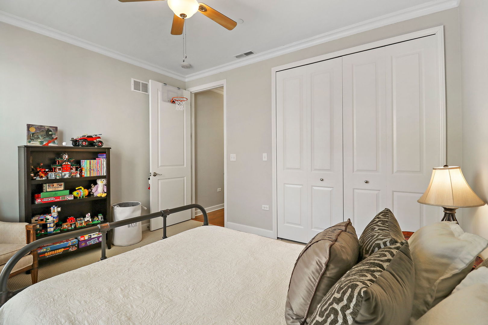 50 North Plum Grove Road, Unit 201E Palatine, IL 60067 - Photo 15 of 22 a bedroom with a bed and a chandelier
