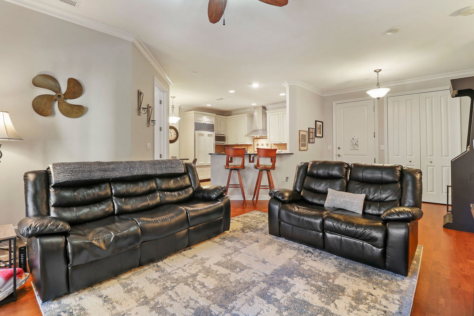 50 North Plum Grove Road, Unit 201E Palatine, IL 60067 - Photo 8 of 22 a living room with furniture and kitchen view