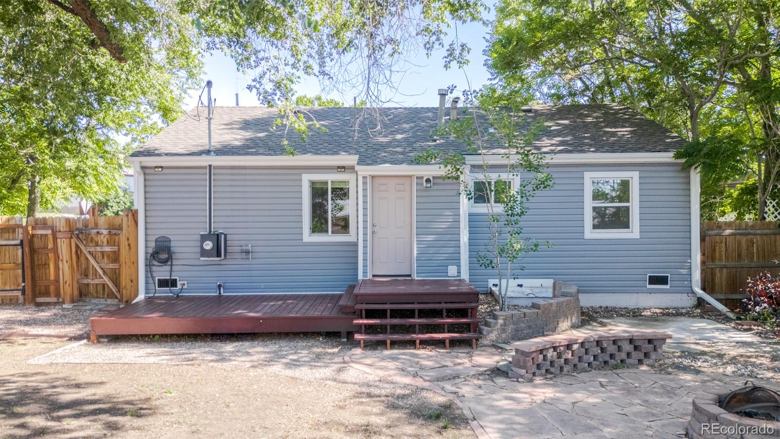 2260 Lilly Drive Thornton, CO 80229 - Photo 25 of 33 a backyard of a house with barbeque oven