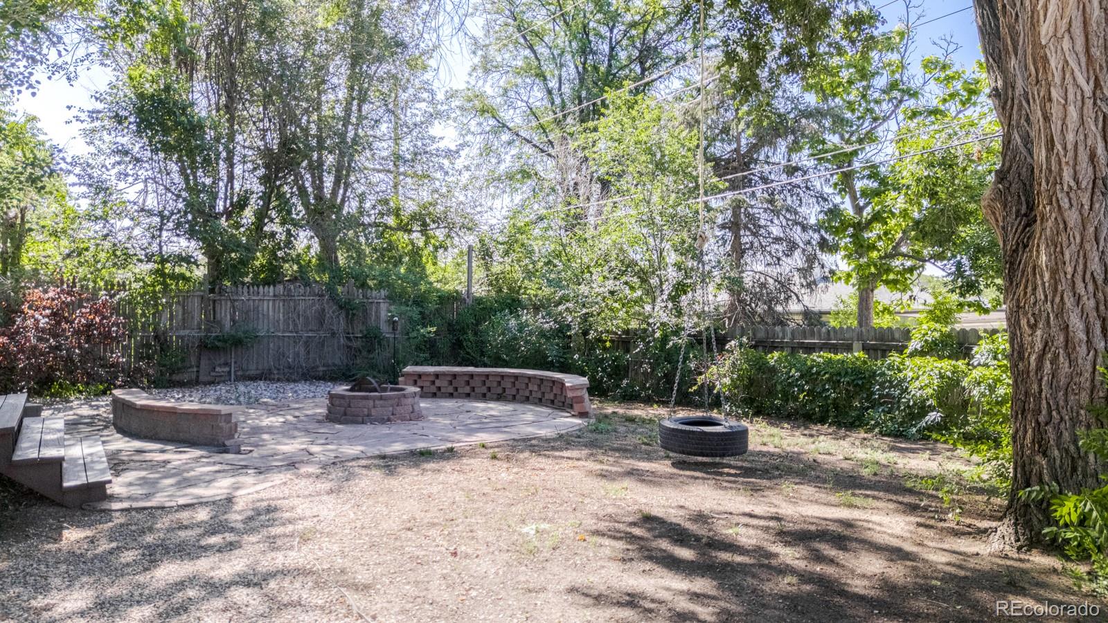 2260 Lilly Drive Thornton, CO 80229 - Photo 27 of 33 a view of a backyard with sitting area